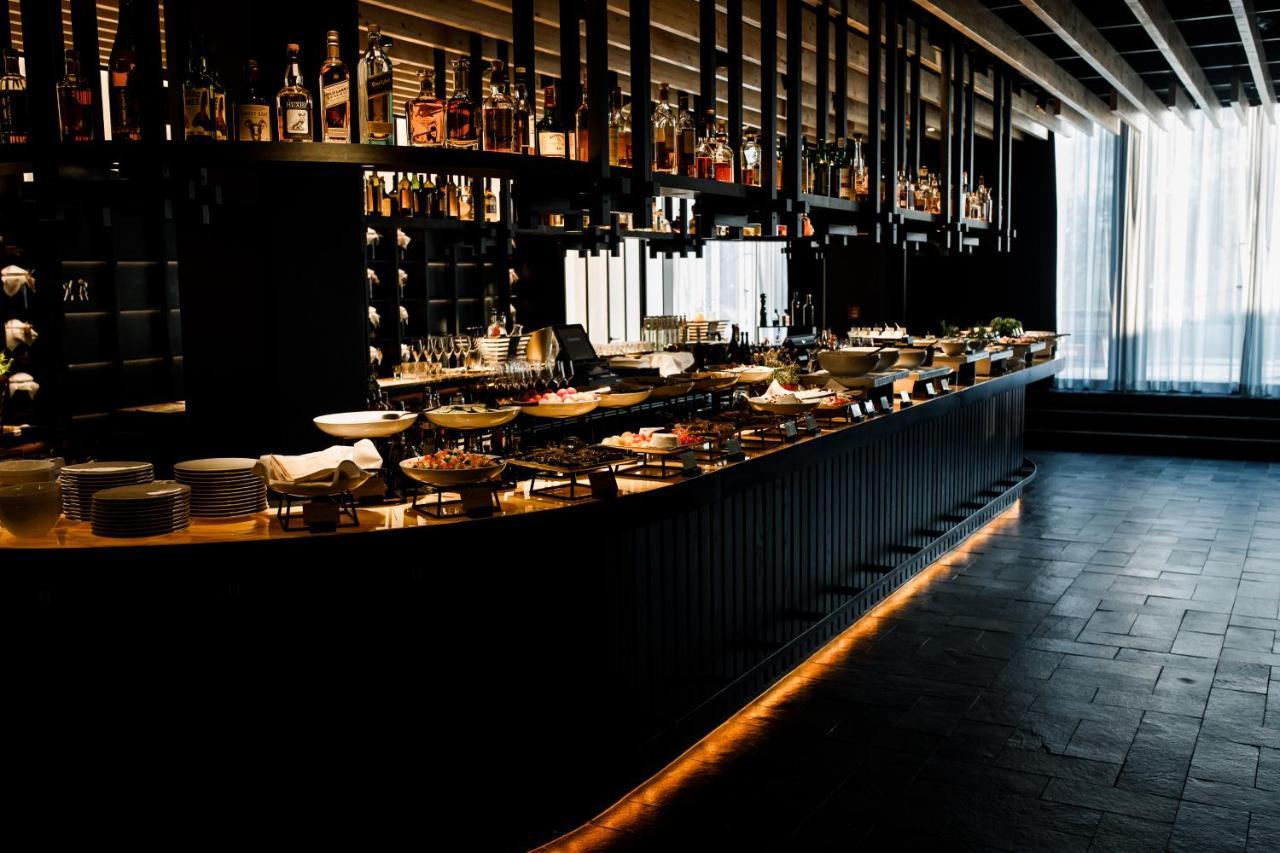 Roomers Munich, Autograph Collection Exteriér fotografie The bar at the restaurant